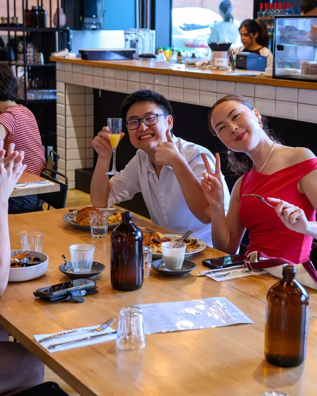 Friends sharing brunch at Maru