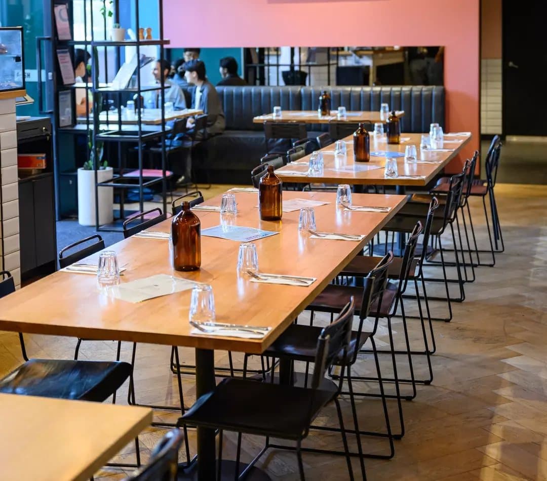 Long tables set up in the Maru dining room